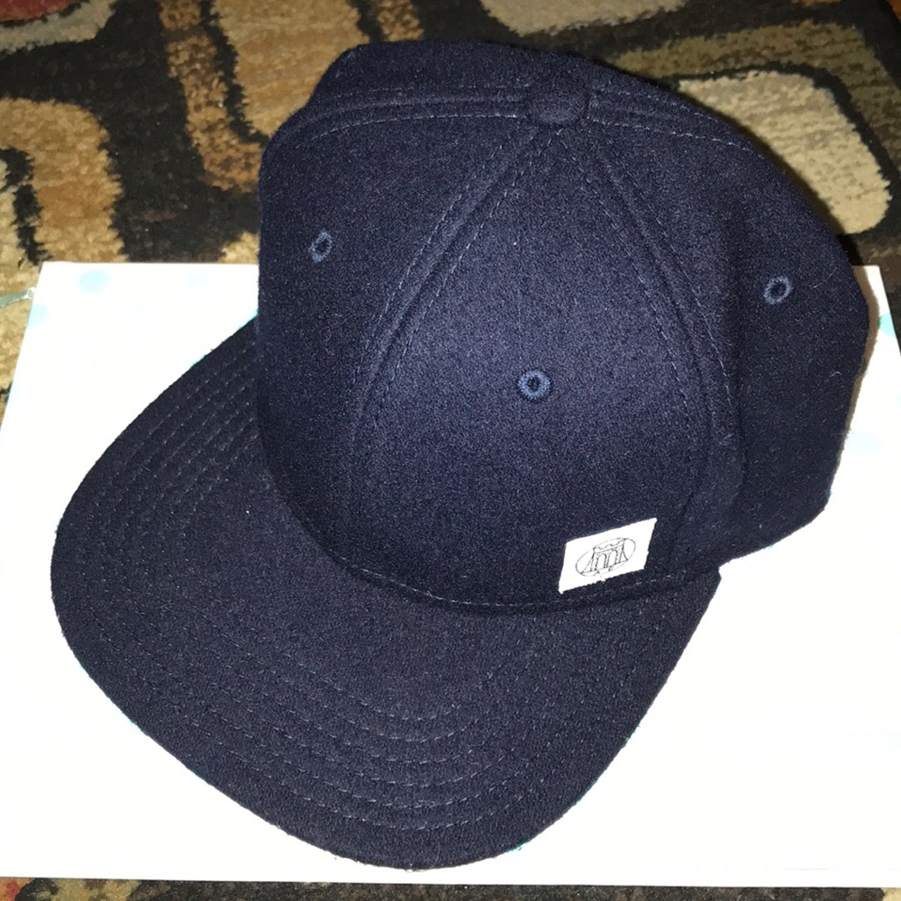 Cotton On snap back hat. Dark navy blue
